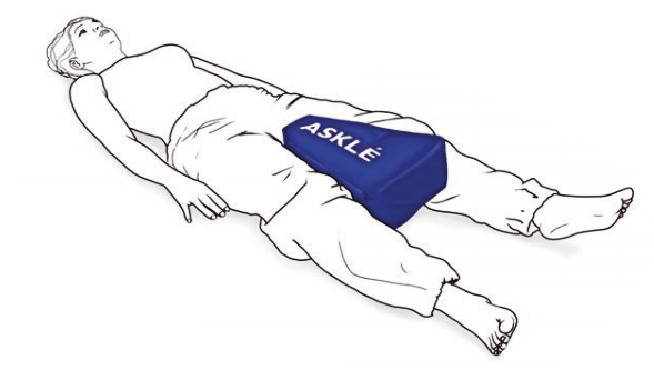 Positionnement entre les jambes du coussin d'abduction de hanches Asklé